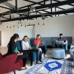 a group of people sitting in a room