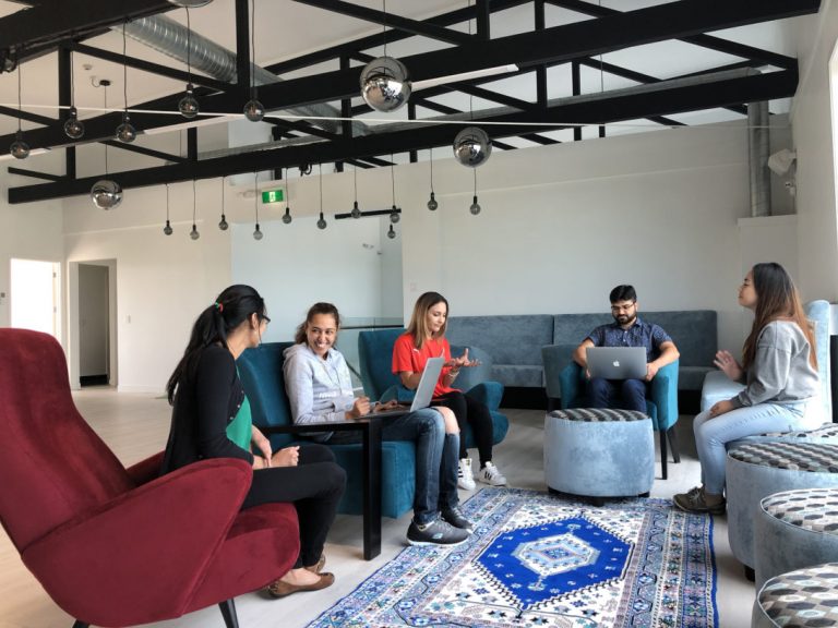 a group of people sitting in a room