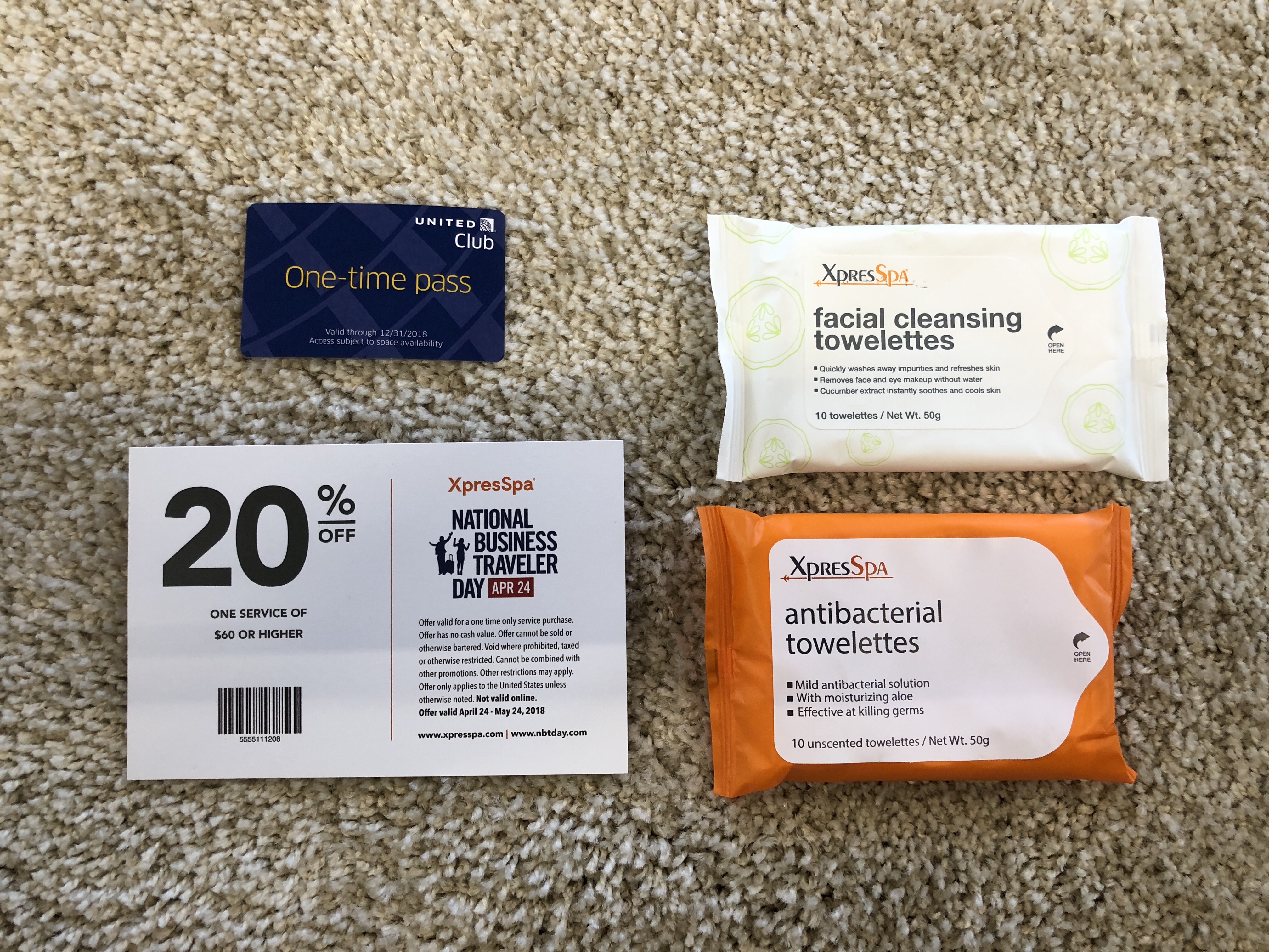 a group of packages of wipes and a card