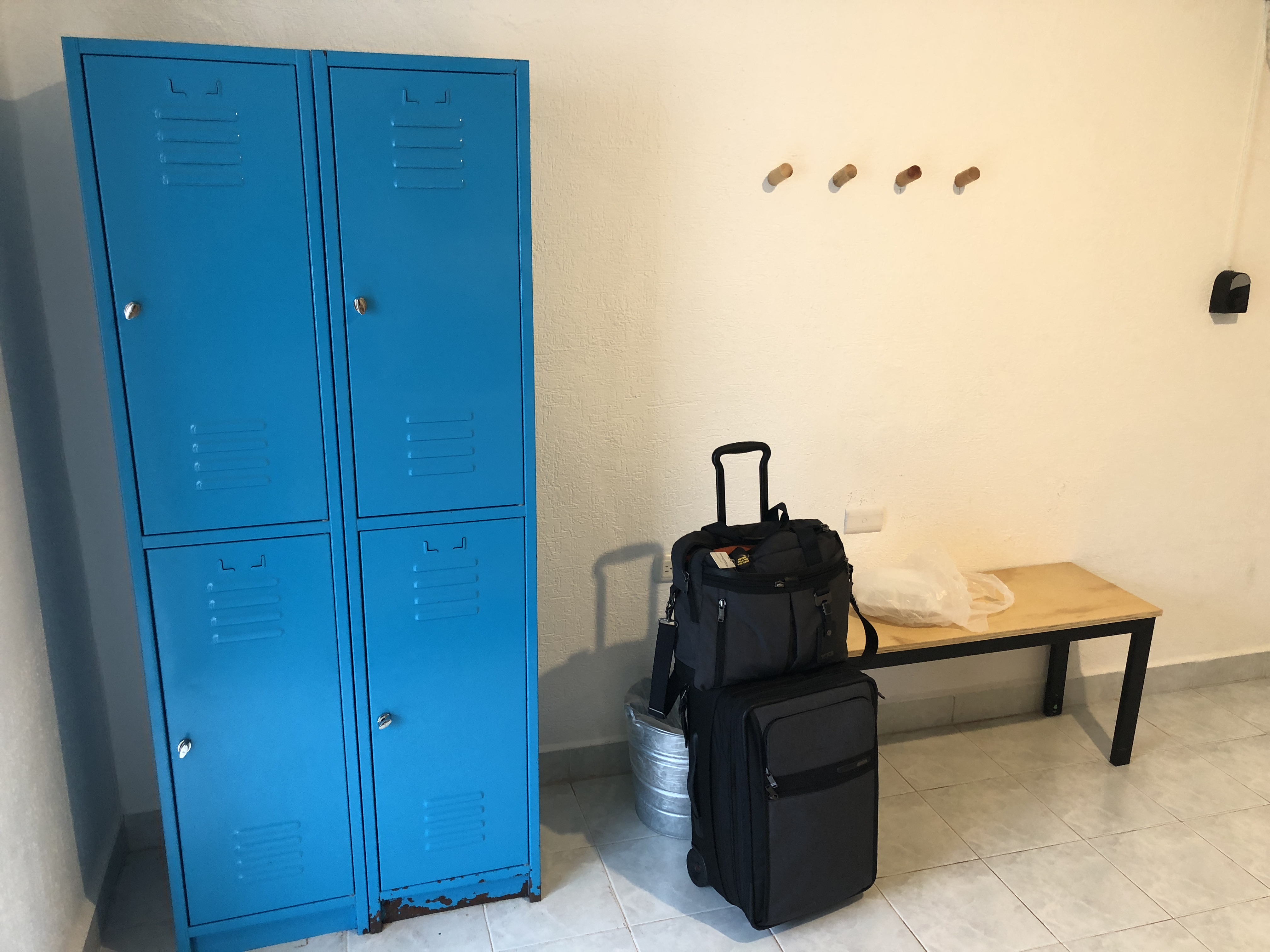 luggage next to a locker