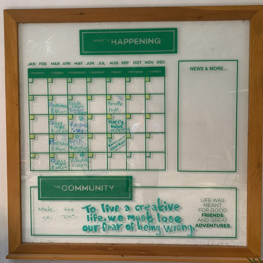 a calendar with green writing on it