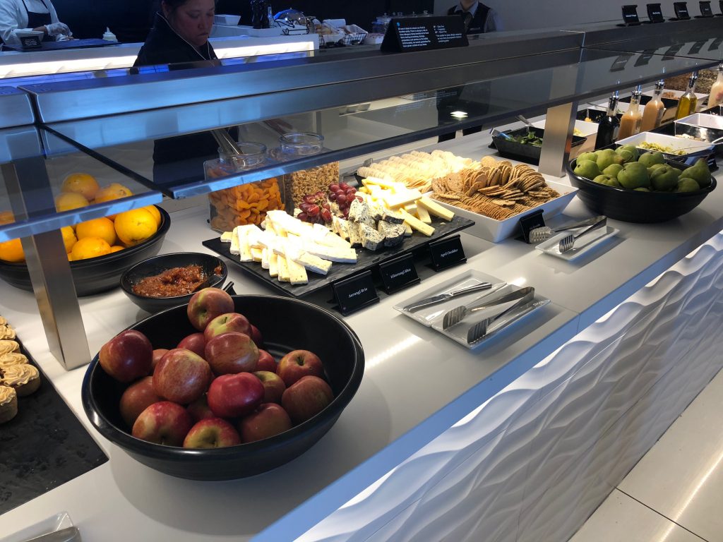 a buffet with fruits and cheese