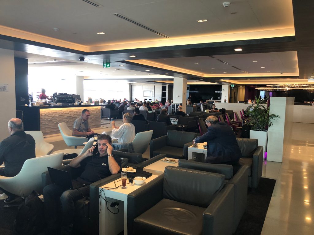 people sitting in a lounge area