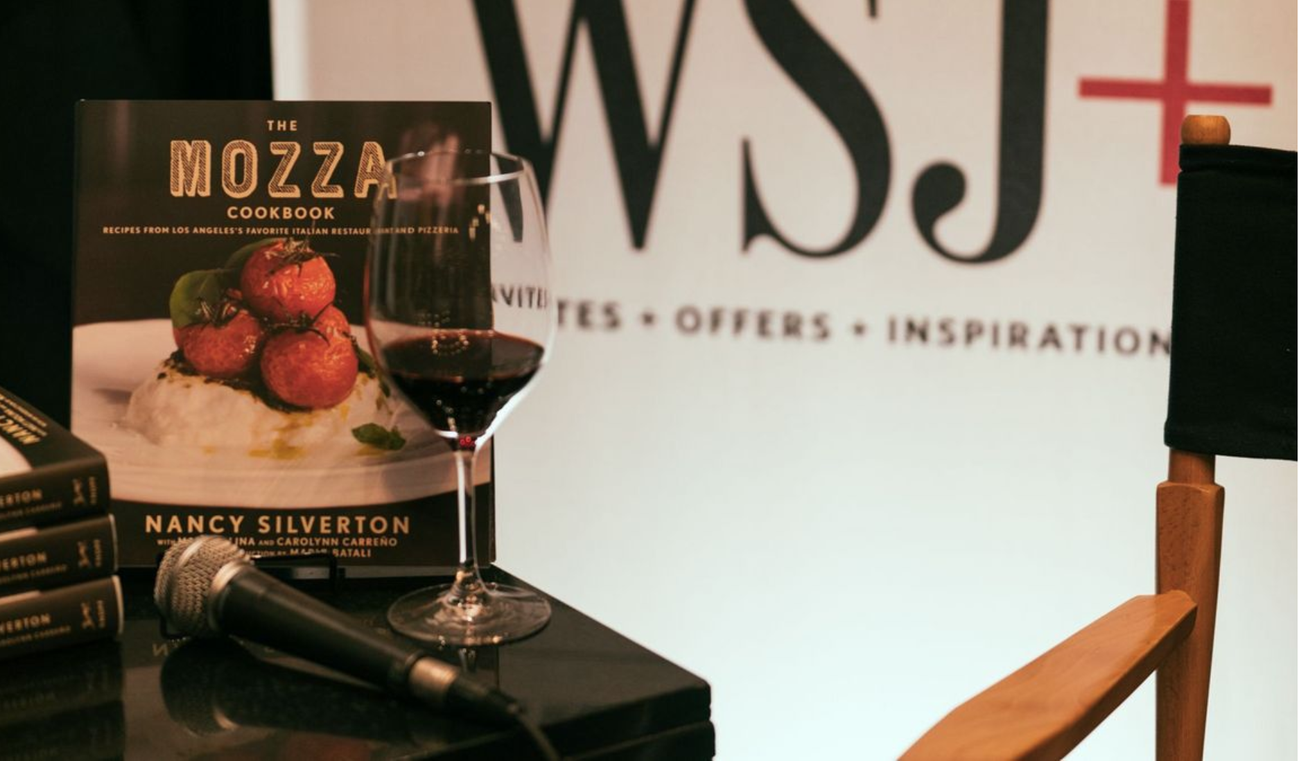 a wine glass and a book