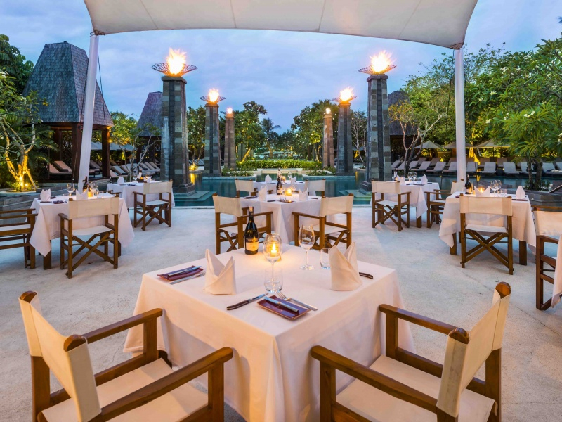 a restaurant with tables and chairs