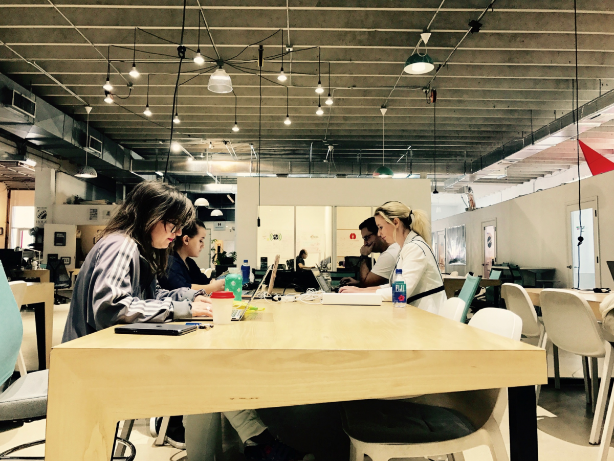 a group of people sitting at a table