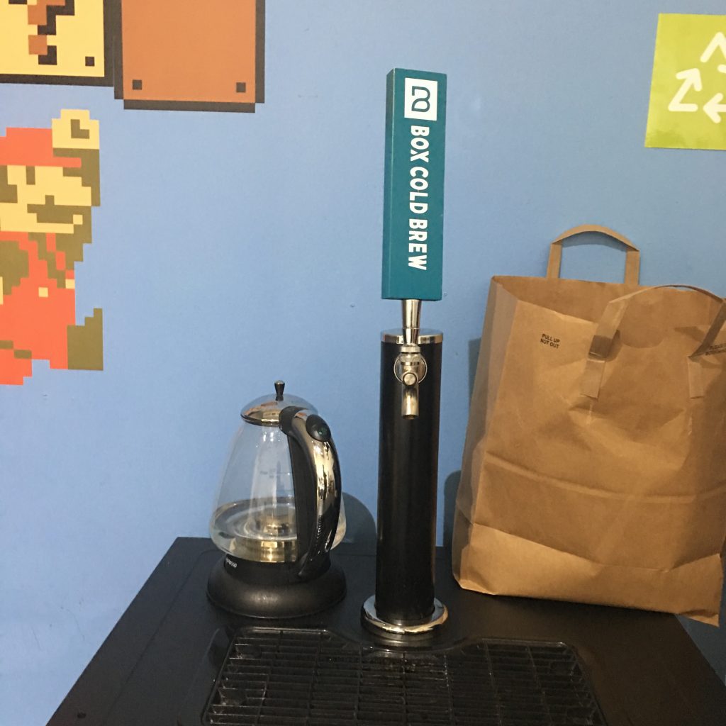 a coffee pot and a coffee pot on a table