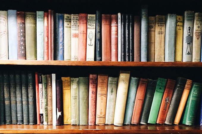 a shelf with books on it