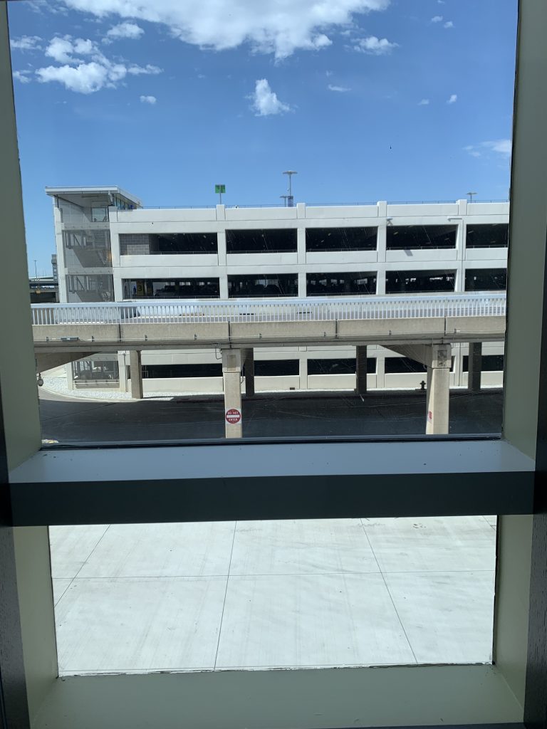 a view of a parking lot from a window