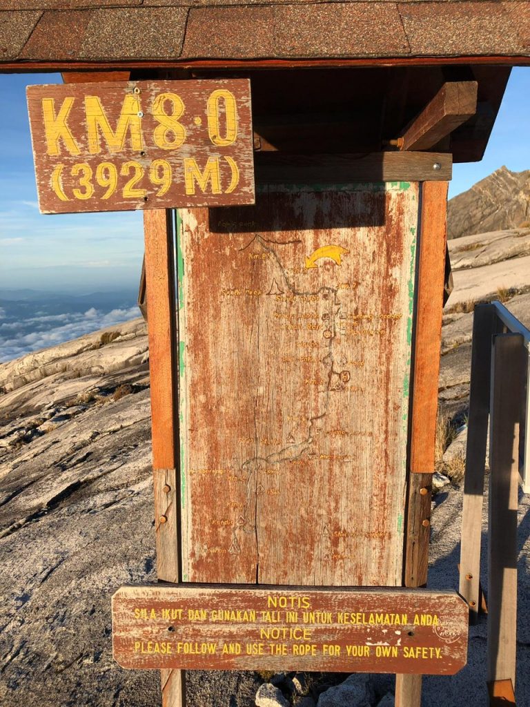 a wooden box on a mountain