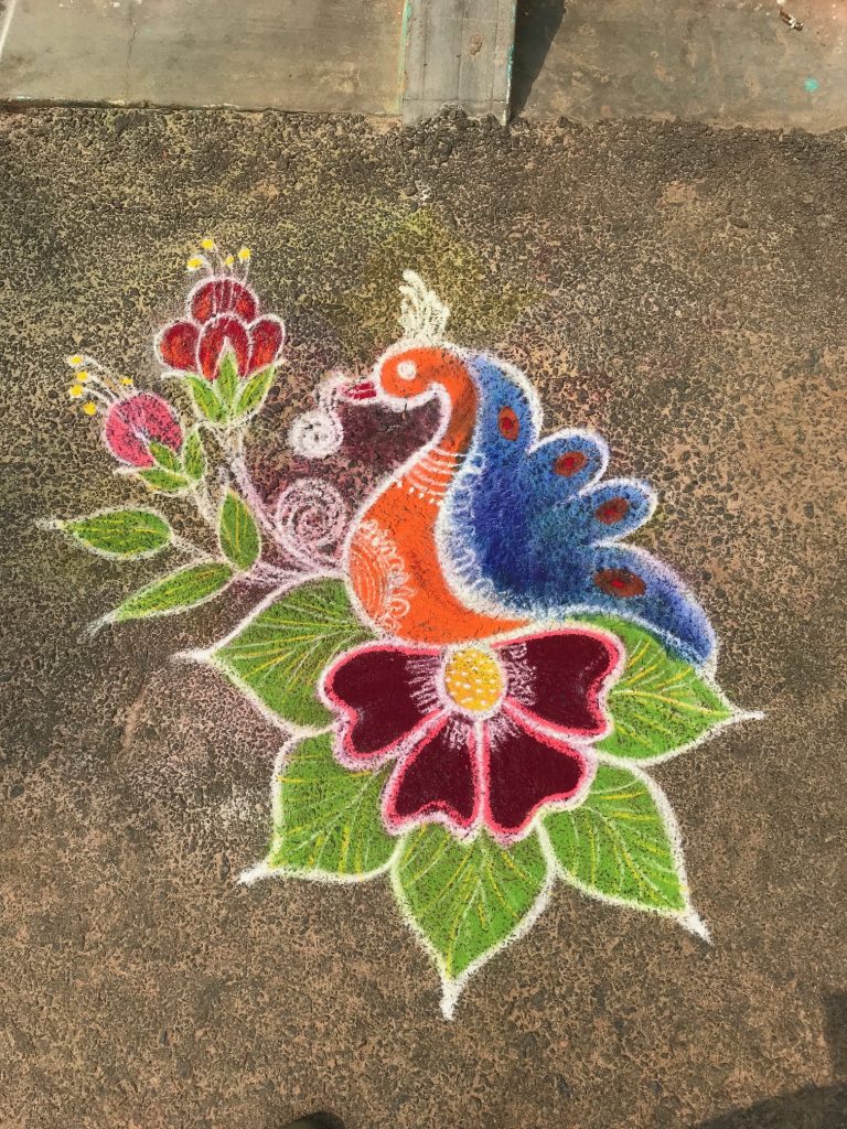 a drawing of a bird and flowers