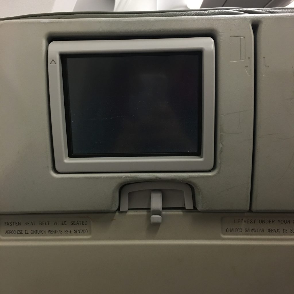 a screen on an airplane