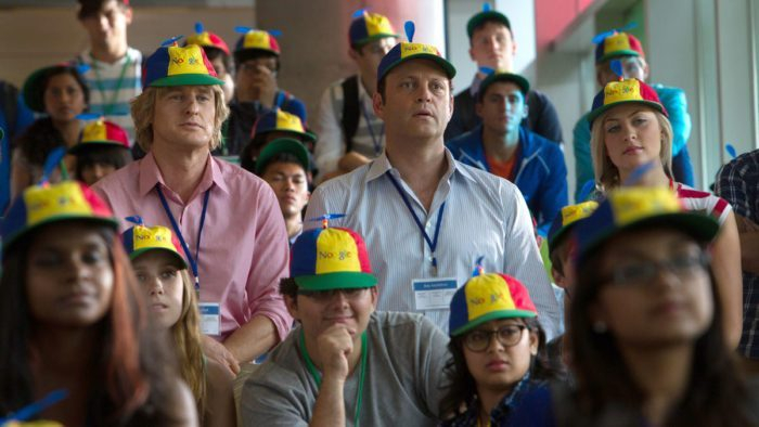 a group of people wearing hats