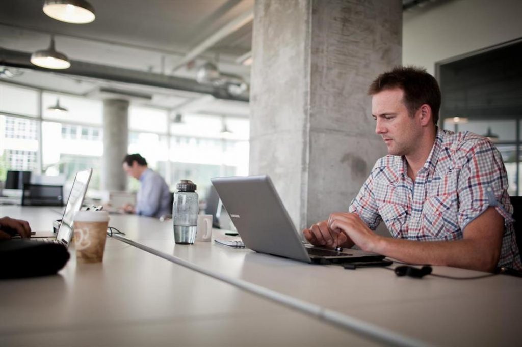 a man using a laptop