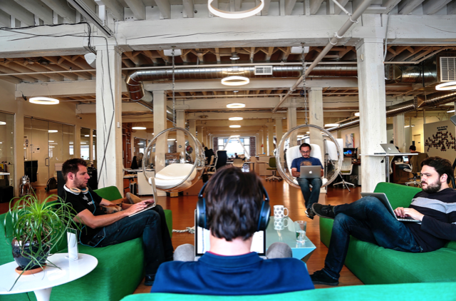 a group of people sitting in chairs