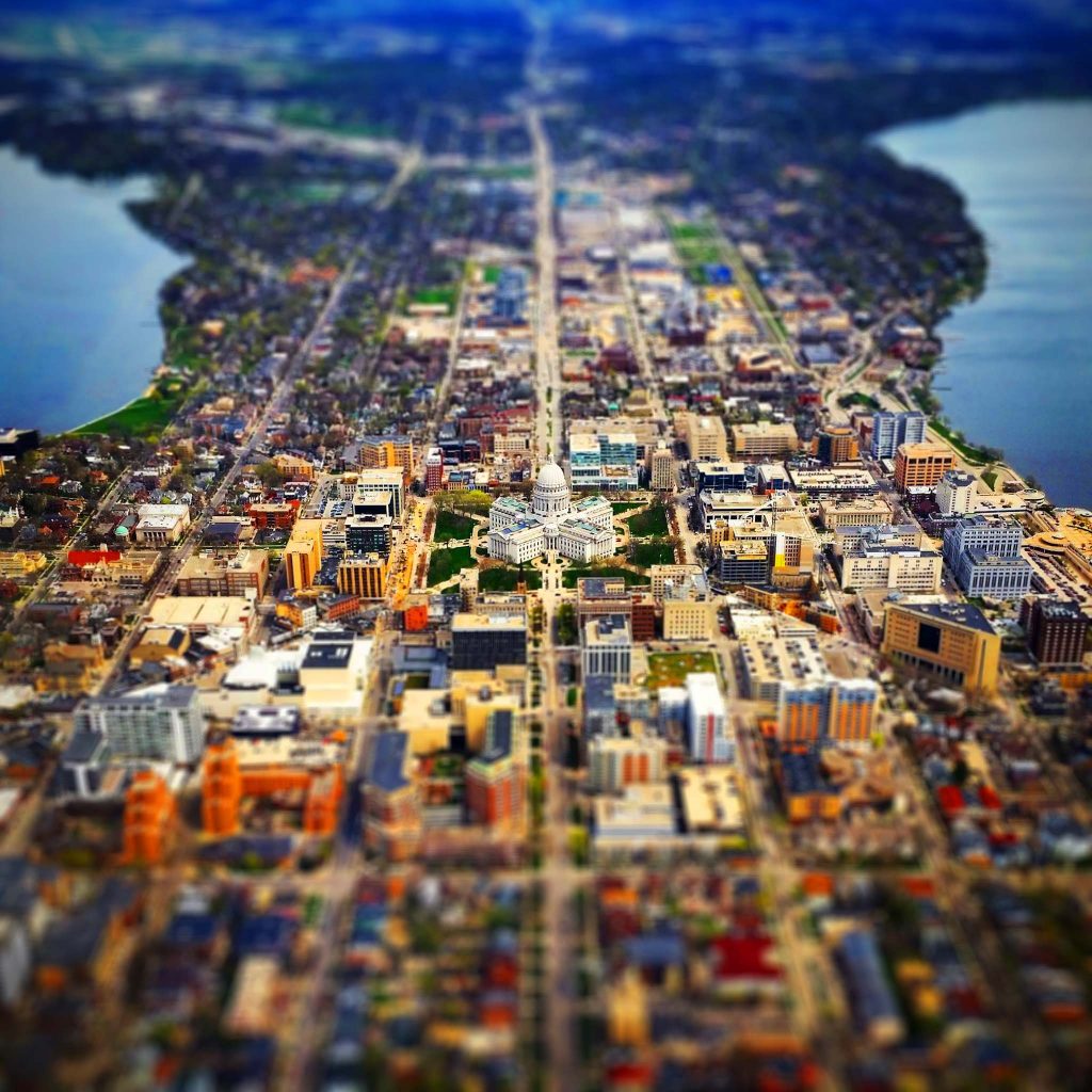 aerial view of a city with a body of water