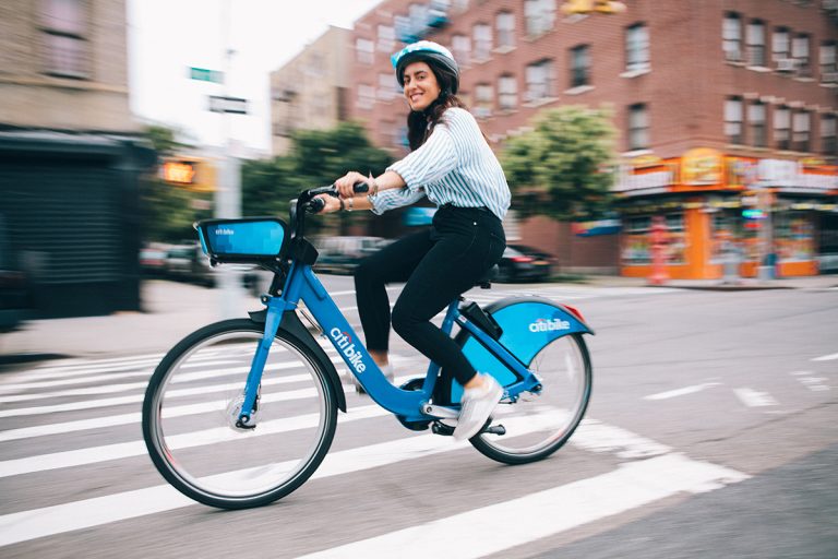 a woman riding a bicycle