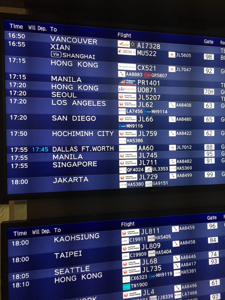 a screen with a flight schedule