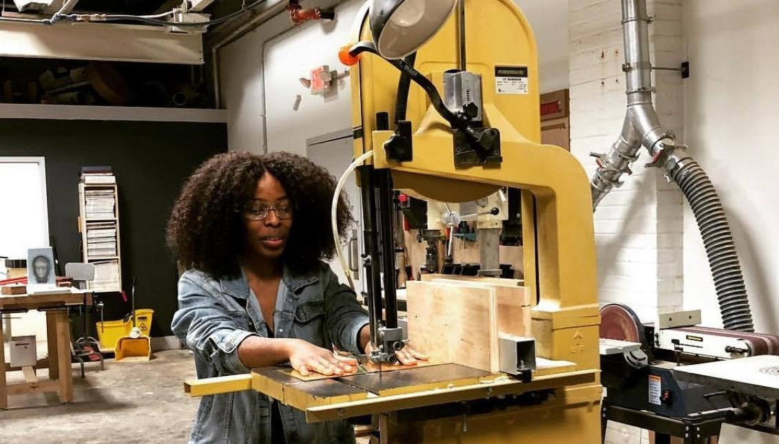 a woman using a machine