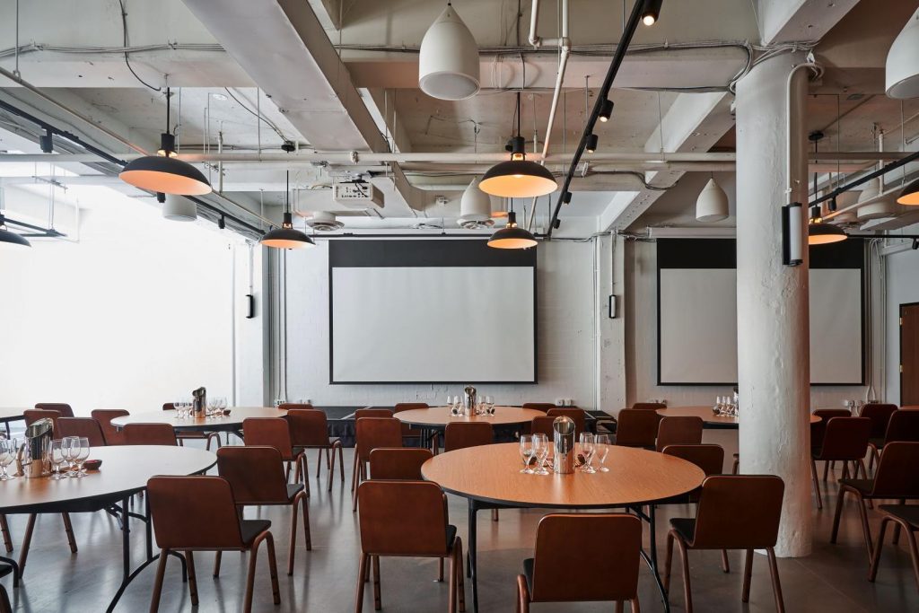 a room with tables and chairs