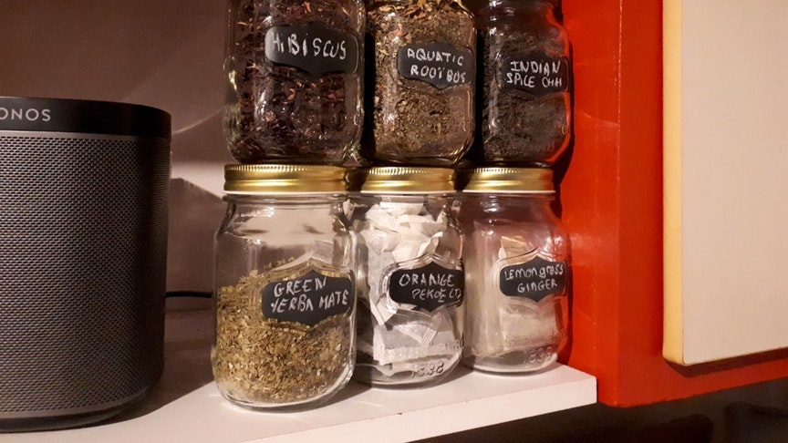 jars with different types of herbs on them