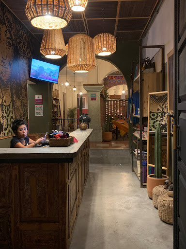 a boy sitting at a counter