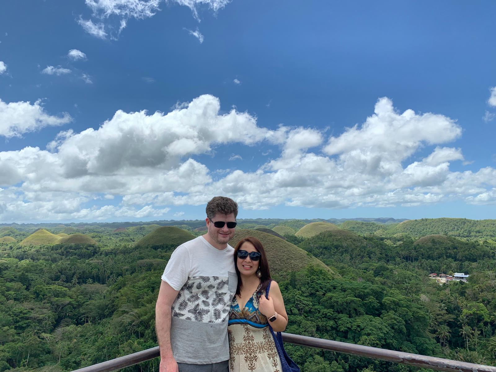 a man and woman posing for a picture