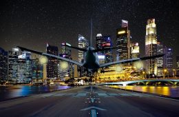 future of travel: plane landing on runway in the city