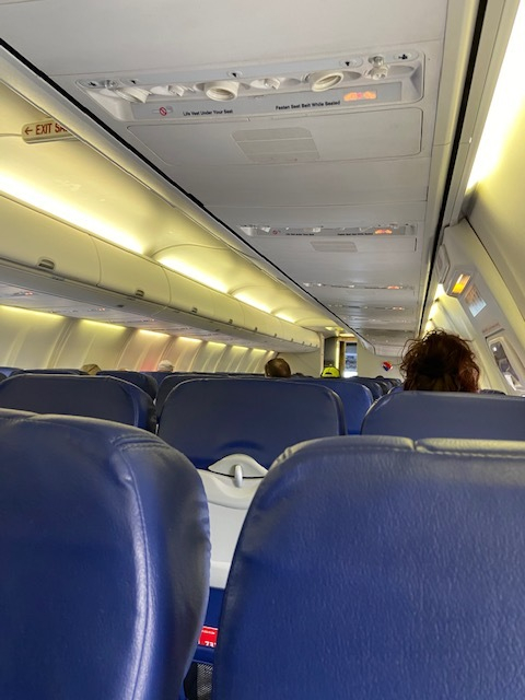 southwest airplane with few passengers