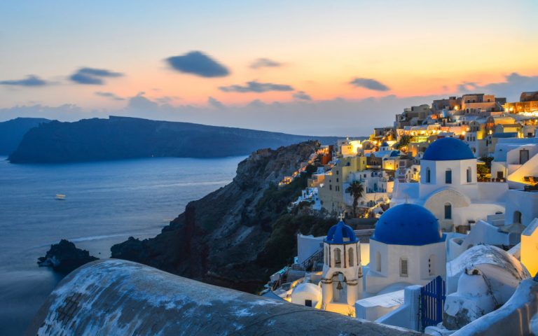 Santorini on a cliff by the water