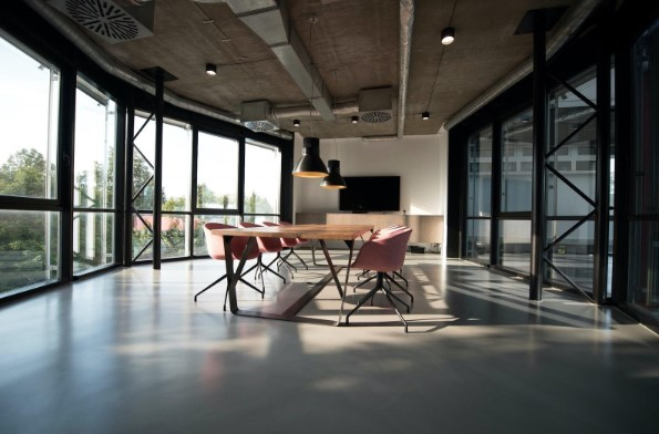 a room with a table and chairs