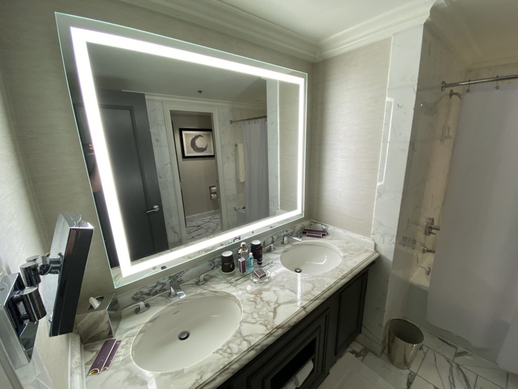 a bathroom with a large mirror