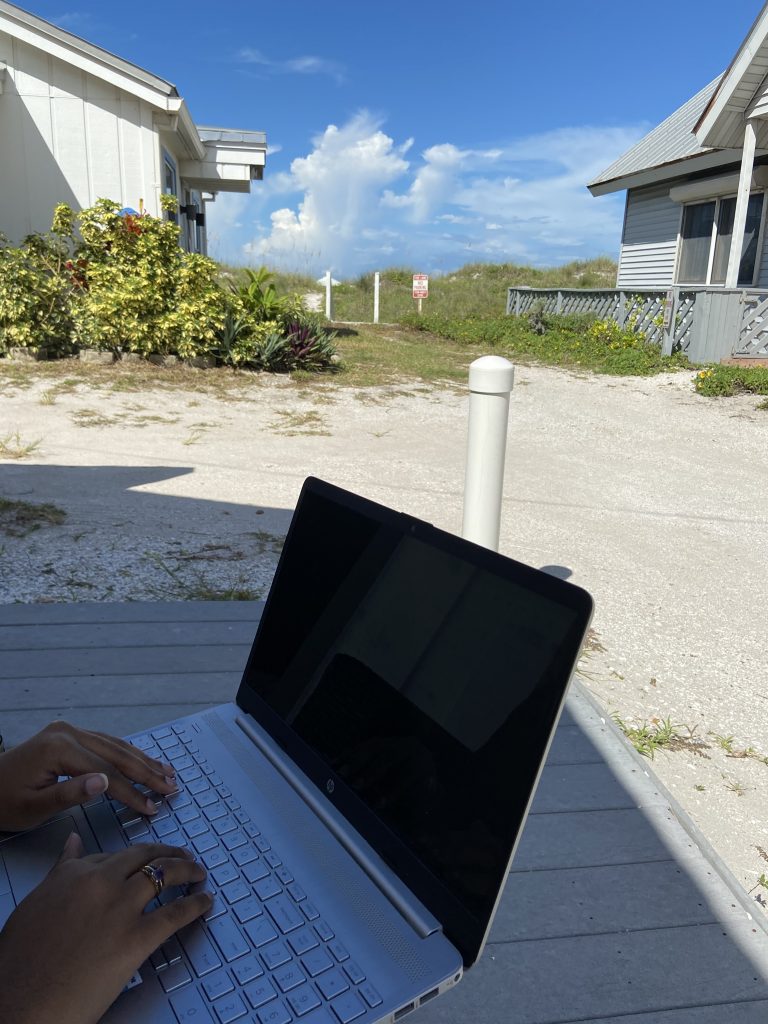 a person using a laptop outside