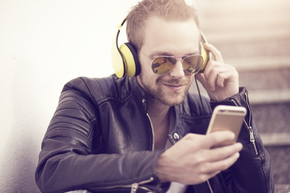 man listening to podcast or music