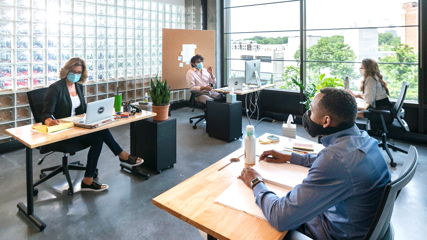 a group of people in an office